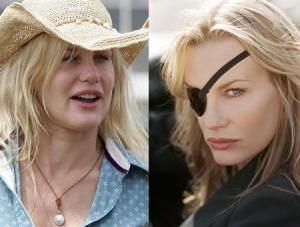 Actress Daryl Hannah, left, talks to Richard Branson, founder of the Virgin Group listens at at the Virgin Festival in Baltimore, Sunday, Aug. 5, 2007. Hannah and Branson demonstrated the eco-educational exhibits on the grounds of the festival. (AP Photo/Jeff Christensen)